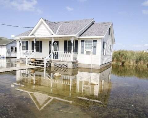 TANGIER, Va. – Tidal waters flood yards in this small Chesapeake Bay island fishing community here September 16, 2016. The community of roughly 470 residents are experiencing the impacts of sea level rise, erosion and land subsidence. Scientist estimate the island may become uninhabitable over the next 25 to 50 years if something is not done to help keep the island above water. (U.S. Army photo/Patrick Bloodgood)