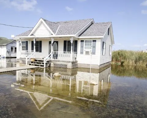 TANGIER, Va. – Tidal waters flood yards in this small Chesapeake Bay island fishing community here September 16, 2016. The community of roughly 470 residents are experiencing the impacts of sea level rise, erosion and land subsidence. Scientist estimate the island may become uninhabitable over the next 25 to 50 years if something is not done to help keep the island above water. (U.S. Army photo/Patrick Bloodgood)