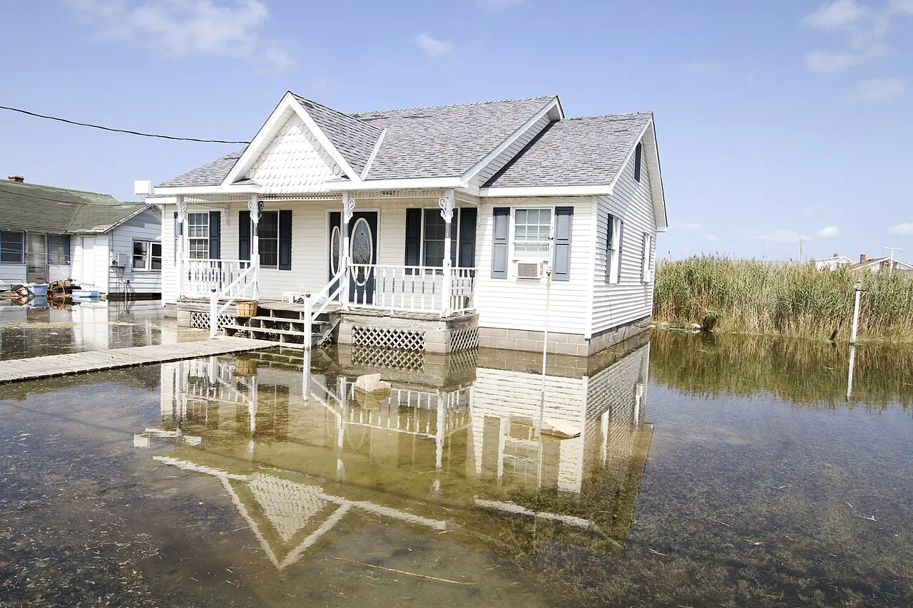 TANGIER, Va. – Tidal waters flood yards in this small Chesapeake Bay island fishing community here September 16, 2016. The community of roughly 470 residents are experiencing the impacts of sea level rise, erosion and land subsidence. Scientist estimate the island may become uninhabitable over the next 25 to 50 years if something is not done to help keep the island above water. (U.S. Army photo/Patrick Bloodgood)